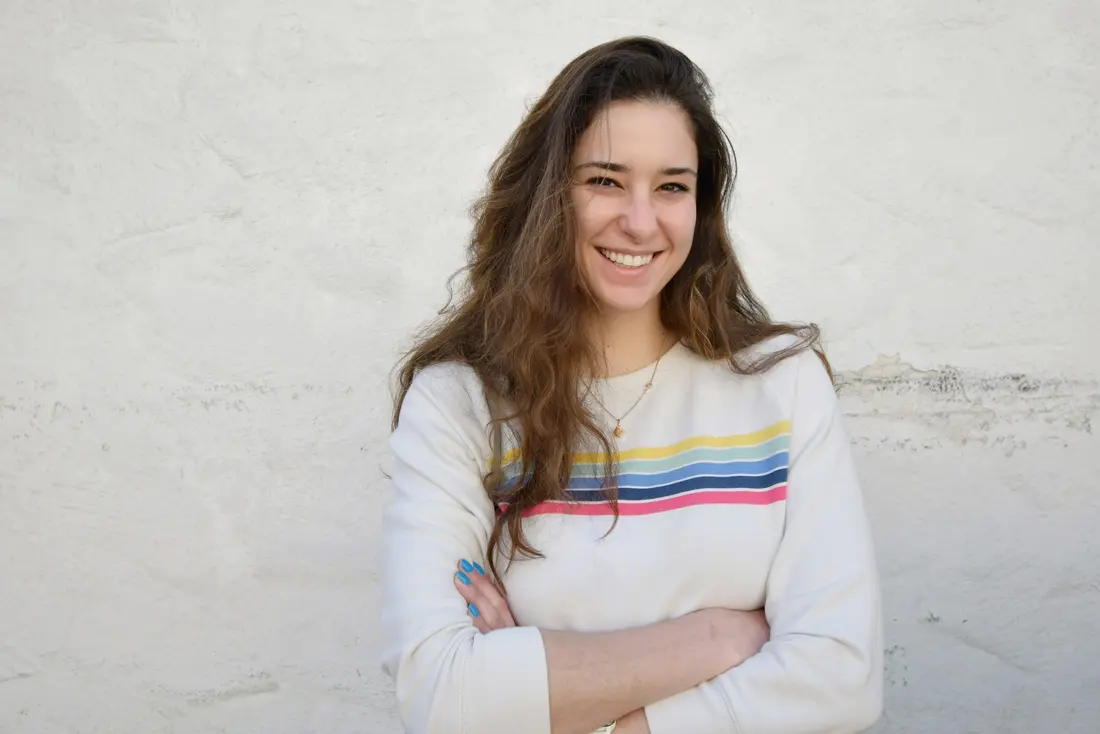 Woman laughing with a bright smile