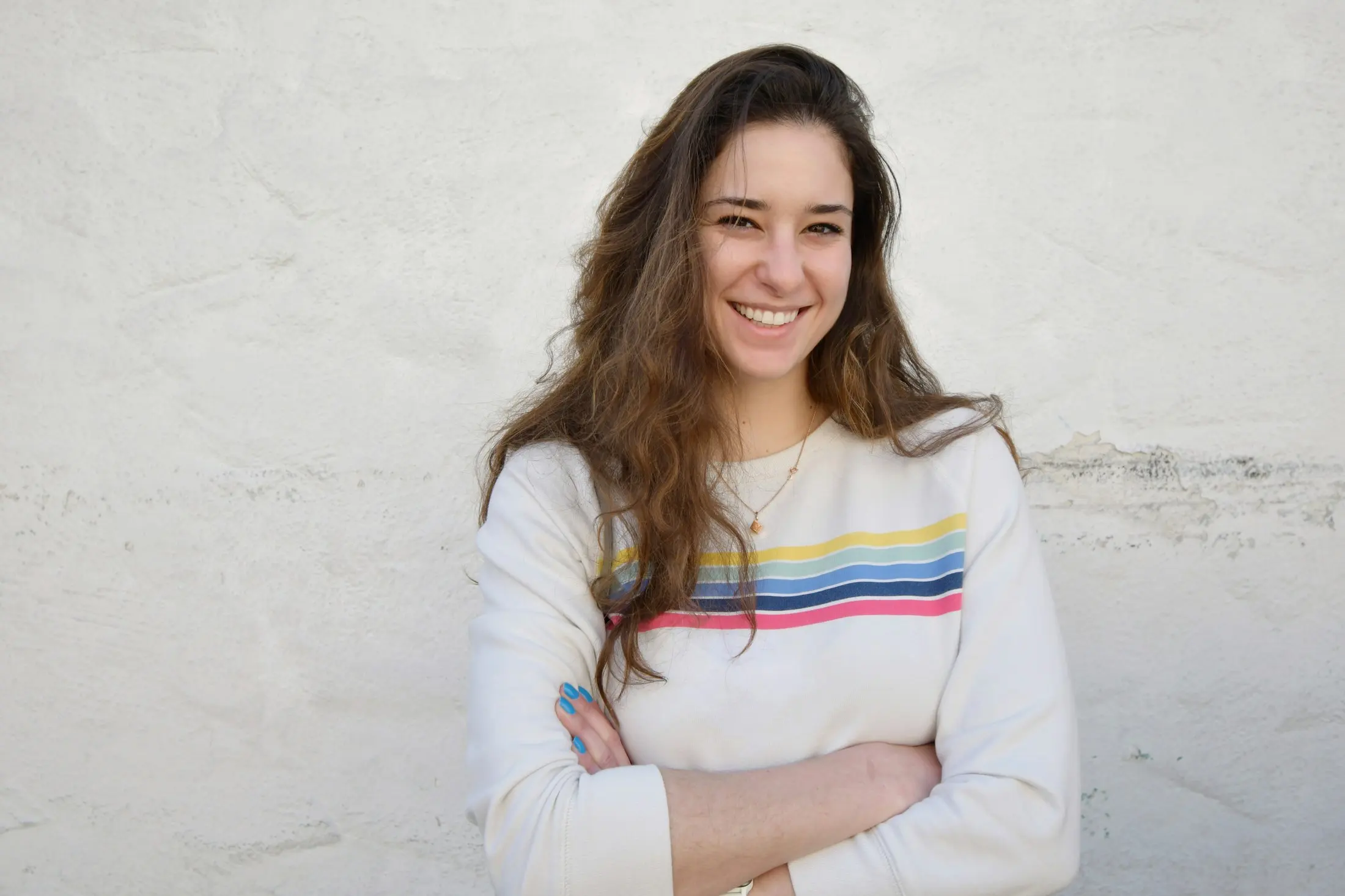 Woman laughing with a bright smile