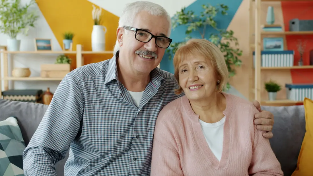 Smiling senior couple at home